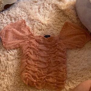 Pink frilly top with puffy sleeves